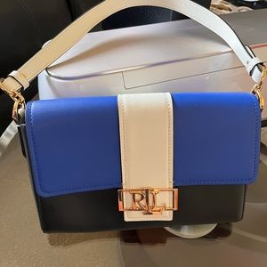 White blue and black gold tone closure and RLL hardware shoulder strap EUC